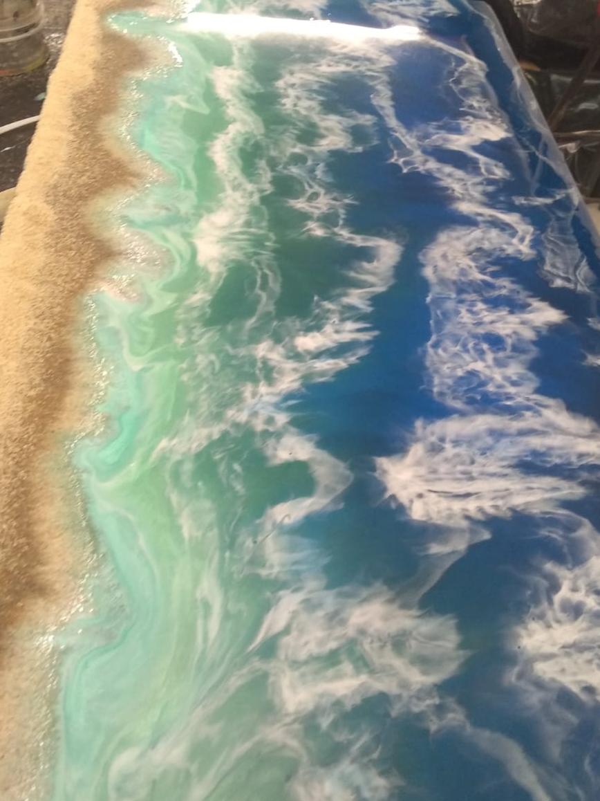 Cubierta de resina con efecto océano en Playa del Carmen